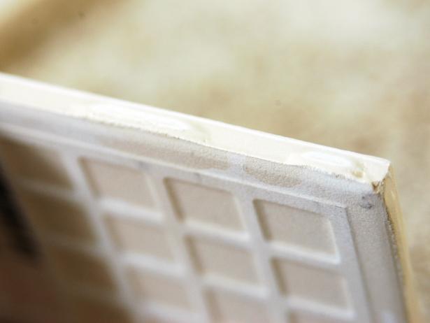 Wall tiles are typically thinner and lighter in weight than floor tiles. Many are made with built-in spacer on their edges, also known as lugs. If your tiles don't have lugs, ask your tile dealer for the proper size plastic spacers.