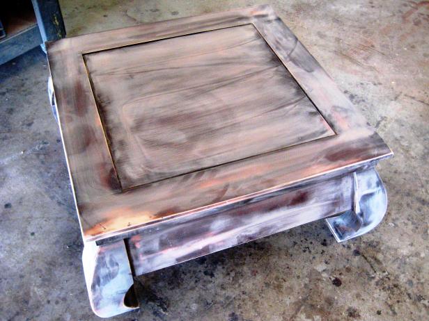 This is how your sanded table should look. Do not try to get to bare wood; you will use less primer if you don't. The goal is to get a smooth surface so that the paint will adhere nicely.