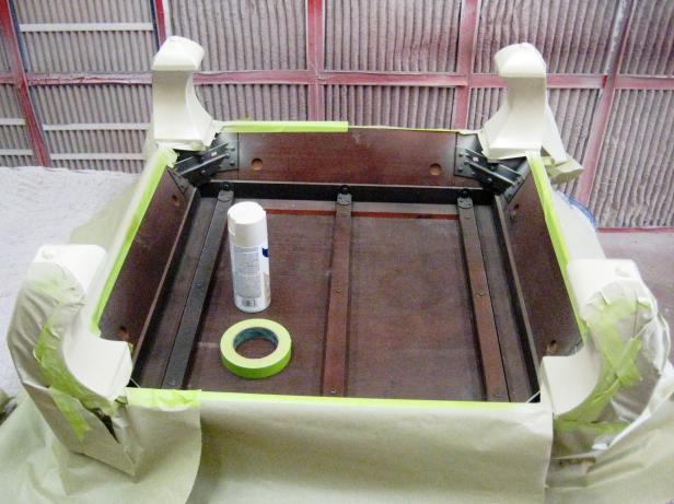 Make sure everything that won’t be getting painted is covered, and spray the stencil color on all four leg interiors.