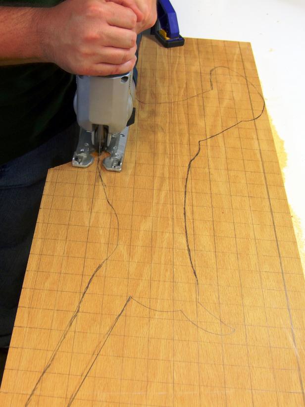 Cut out the reindeer body using a jigsaw following the pattern drawn from the guide. You will be making two of these.