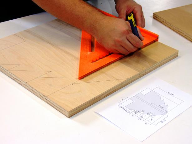 Use the layout template as a guide for marking the tree sides. A square is helpful in marking the diagonal lines. Be careful when marking the lines in the center of the tree. This center 3/4-inch-wide area is the slot where the two tree sides will intersect.