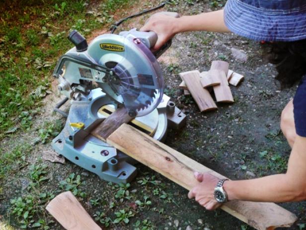 Cutting wood with saw Cutting wood with saw