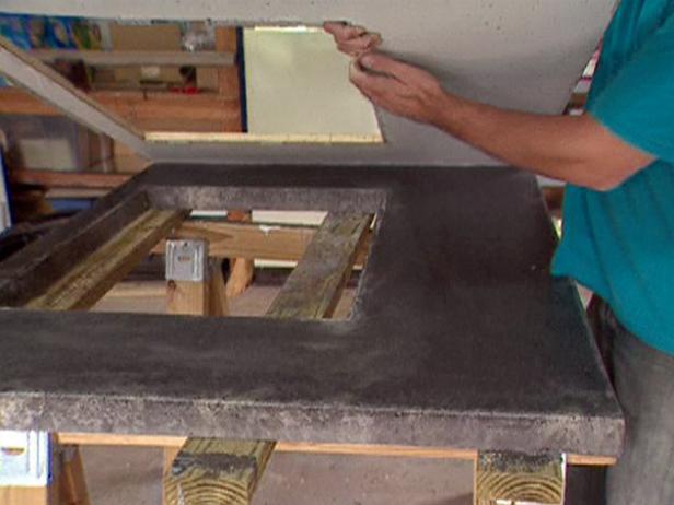 Get help from another person or two to flip the slab over. Remove the cutout sides using the same technique.