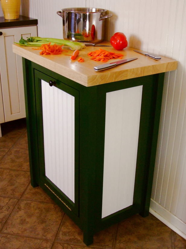 Remove the door, fill nail holes and paint the assembly as desired. Attach a door pull, centered on the top door rail.