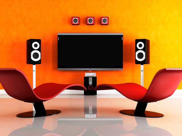 Modern Media Room With Red Chairs And Orange Walls Modern Media Room With Red Chairs And Orange Walls