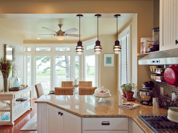 White Kitchen With Neutral Peninsula, Pendant Lights and Ceiling Fan White Kitchen With Neutral Peninsula, Pendant Lights and Ceiling Fan