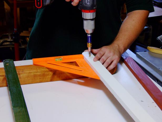 Position the rungs and attach to the stiles using 1 1/4" deck screws (no glue). Use a square to help in positioning the rungs.
