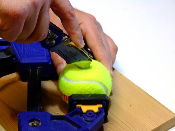 Bolos are simply two balls tethered by rope. This project uses tennis balls because they're easier to cut. Use an awl and utility knife to cut a small slit on each tennis ball.
