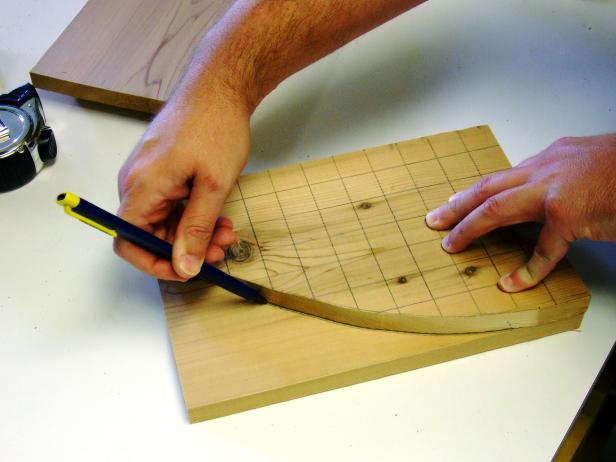 Use a jigsaw to cut the pattern. Trace the shape of the arc on the remaining wing piece and cut them to shape.