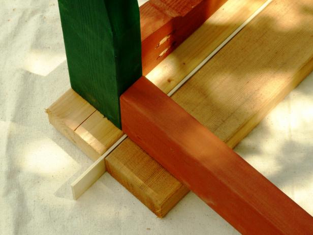 Use a ruler to evenly space the slats for your bench seats.