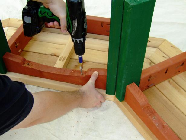 Attach pieces of side trim to the bench seat using a drill.