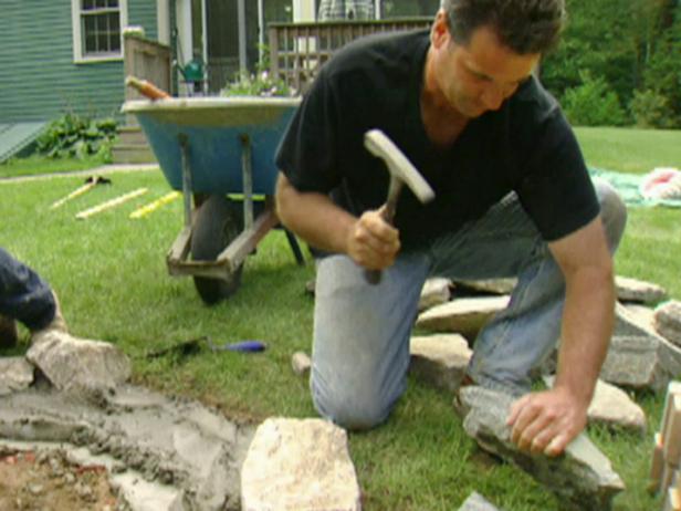 When using natural stone mix the sizes and colors of the stones, and choose stone faces that are attractive and match the slight curve of your outline. When necessary use a chipping hammer to shape individual stones.