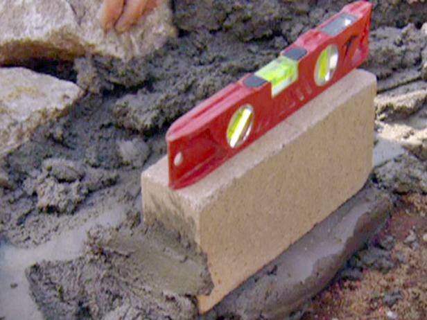Level each fire brick.