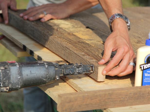 Attach the edge trim to the tabletop with a finish nailer.