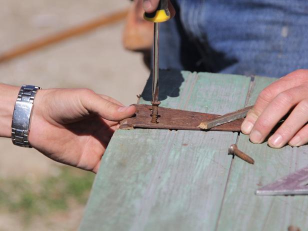 Use the original screws on your dry bar door hinges to complete your rustic look.