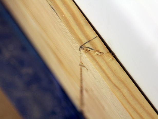 To avoid the visible gap and to "hide" the seam, a bevel cut with the miter saw is made. Set the wood flat on the saw base, rotate the saw blade 45 degrees and make the first cut. On the second piece of top rail, another 45-degree bevel cut will be made in order to "slip" the end underneath the first cut.