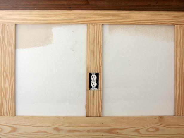 When nailing stiles around wall receptacles, it is important to hit the wall studs adjacent to the receptacle. Receptacles are typically nailed to a wall stud before the drywall is installed.