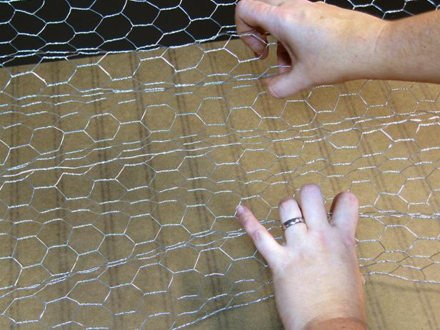 On a 36-inch length of a 1-inch cell wire, create four curved folds down the length.