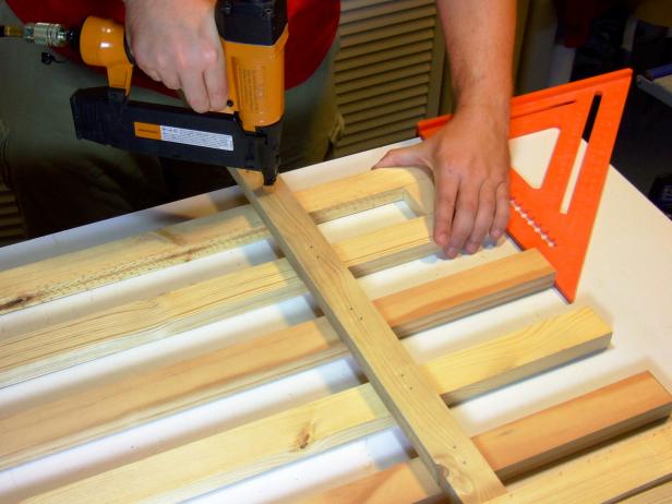 Position the last picket flush with the end of the rails. This will leave about 1-1/2 inches between the last two rails.