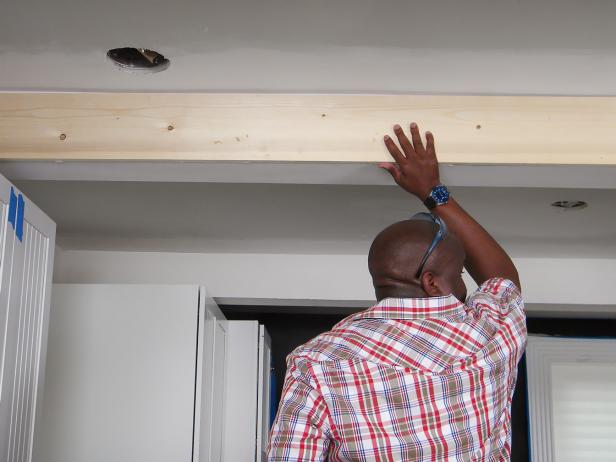 An assistant will be very helpful in holding and aligning the girder wrap pieces in place while they are attached.