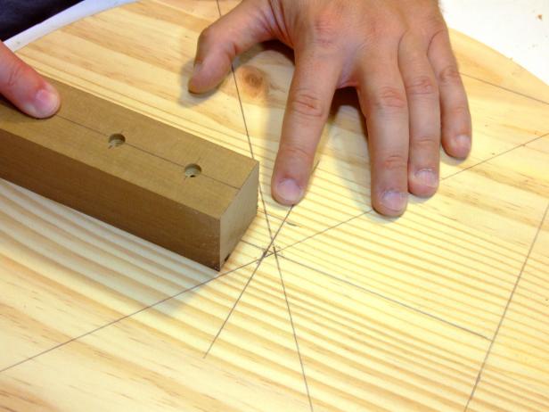 Cut 45-degree angles on one end of the neck. Attach the neck to the head using glue and 2" deck screws. Drill countersunk pilot holes for the screws.