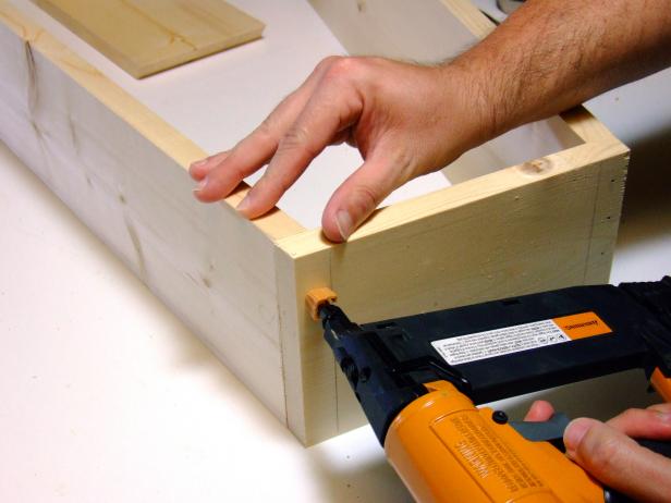 Attach the bottom end to the sides using glue and #18 x 1-inch wire brads.