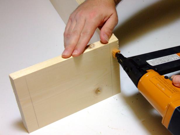 Attach the bottom end to the sides using glue and #18 x 1-inch wire brads.