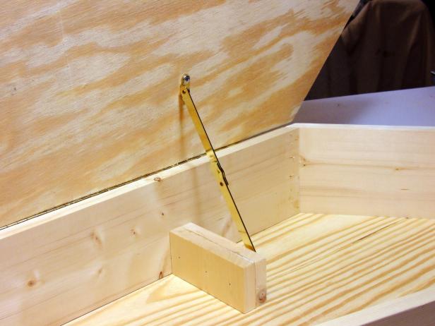 Position the lid perpendicular to the coffin assembly and attach the other end of the hinge to the lid using #8 x 1/2" washer-head screws.