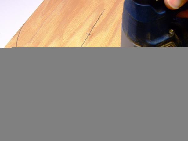 Use a jigsaw to cut out the shape of the tombstone body.