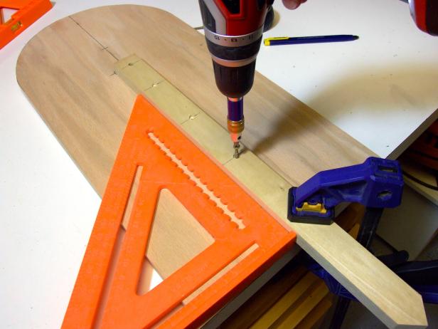 Attach the step using glue and 1-1/4" deck screw.