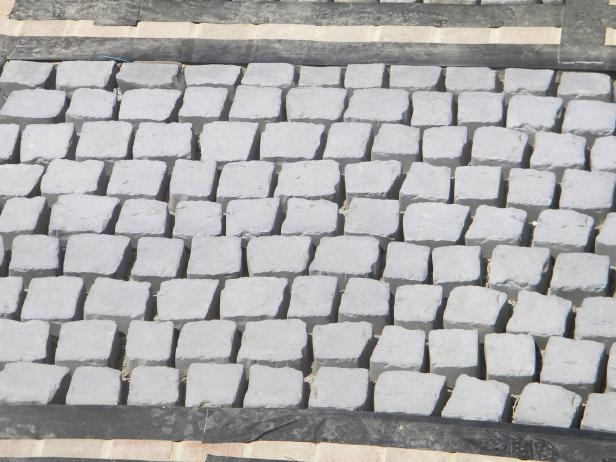 Place tape over the brick border to keep the bricks free of epoxy.