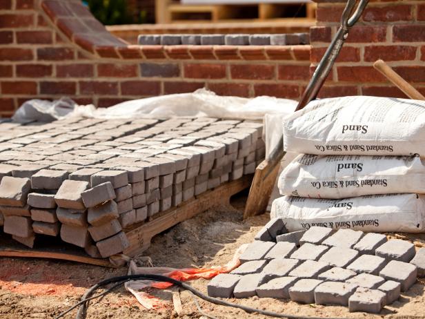 There is a vast selection of paving bricks available in many colors, sizes and textures. Ask your local brick supplier to estimate the brick needs based on the plan. About 460 bricks covers 100 square feet. One pallet holds 500 bricks. Inside the brick border is stone dust (2” thick). The brick supplier will assist in the quantity of stone dust needed.