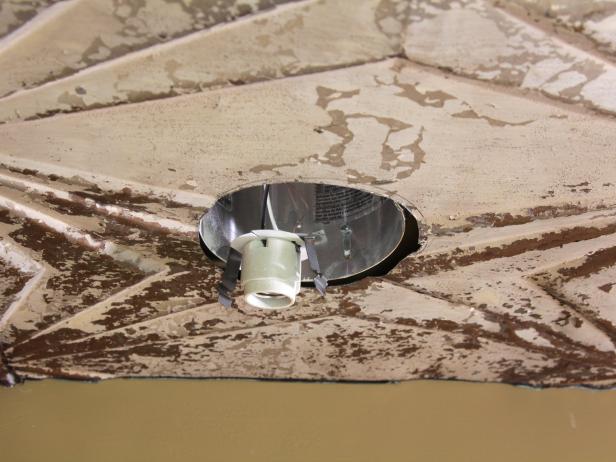 If necessary lower the ceiling fixture boxes to the level of the furring strips. Some modifications to the fixture boxes may require an electrician if the DIYer is unable to make the adjustment.