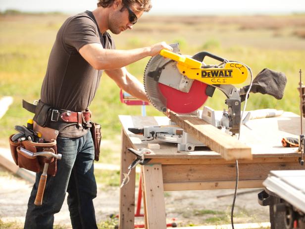 Transfer the post-to-post dimension and cut a 2” x 4” to this width using the miter saw.