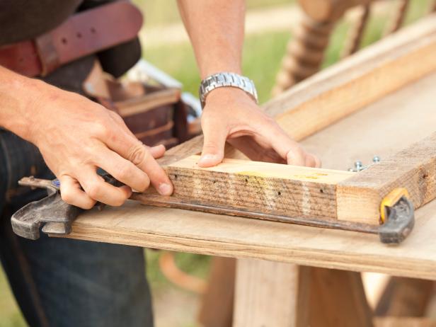 With the side perimeter band holes drilled, lay out the pieces and clamp them in place. Screw the pieces together to make the perimeter band.
