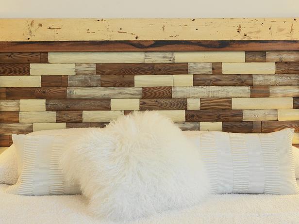 This rustic, chic headboard was made from a section of an old picket fence. The pickets were cut up into small pieces, cleaned and then refinished in a few different ways. Then the pieces were fitted into a frame made from more weathered lumber.