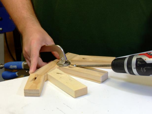 Drill pocket holes in the ends of the upper arm. Assemble the hands using glue and pocket-hole screws.