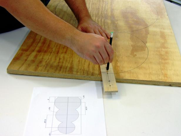 Use a beam compass or do-it-yourself compass to make the marks for the body.