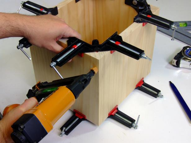 Use corner clamps to position four feet.