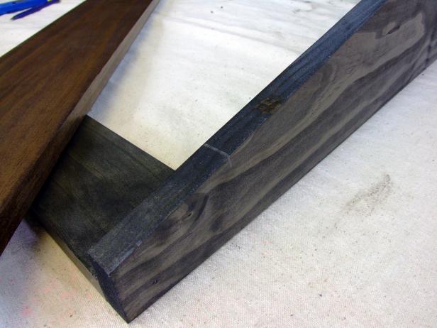 Positioning the first wide headboard slat.