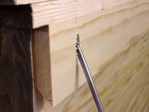 Position the headboard cleat flush against the sub head and the outside edges of the side stiles and clamp in place. Attach the headboard cleat to the sub header using glue and 1-1/4-inch pocket-hole screws. Attach the headboard cleat to the side rails using glue and the side stiles using glue and 1-1/4-inch brads.