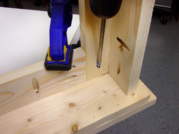 Attach frame to headpiece using glue and 1-1/4-inch pocket-hole screws. Be sure to clamp the assemblies in place before joining them.