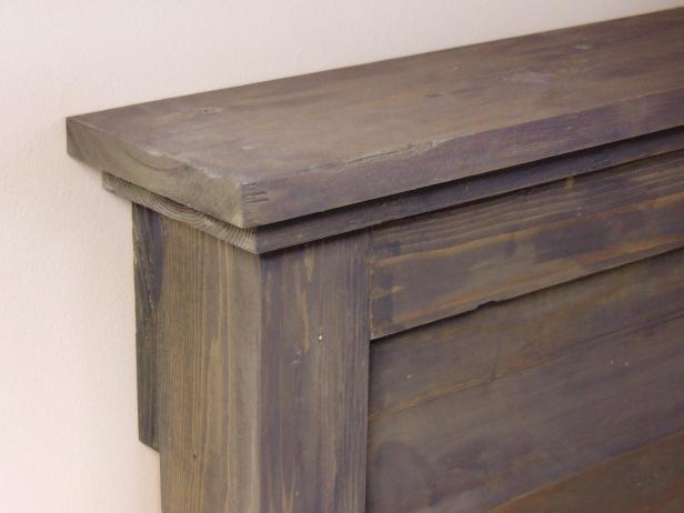 Position the headboard assembly in the desired location, flush against the wall to which you plan to install it. Place the wall cleat flush underneath and against the headboard cleat. Mark the position of the wall cleat.