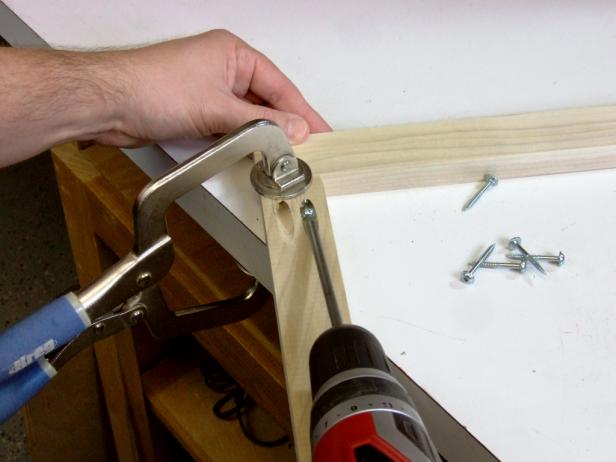 Drill two pocket holes in each end of the face frame rails. Position the face frame rails flush with the ends of the face frame stiles and attach using glue and 1-1/4-inch pocket-hole screws.