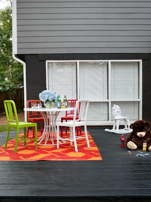 Stained Deck With Colorful Dining Space Stained Deck With Colorful Dining Space