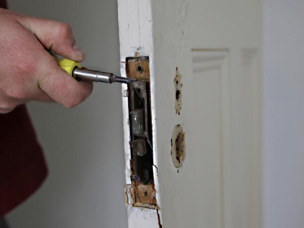 Remove the hardware from the doors. Keep the pieces.