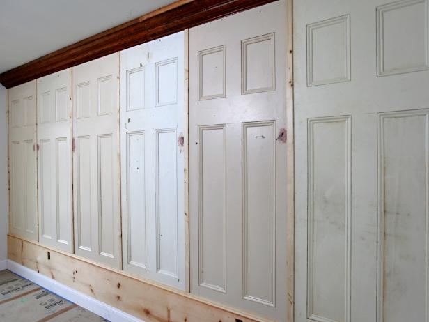 Once all the trim is mounted, hire an electrician to pad out any outlets to the new wall plane.