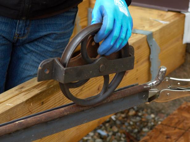 Use the wheel to measure the distance from the wheel-mounting surface to the back of the track (wall plane).