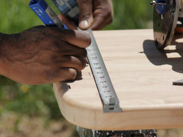 Next, examine the butcher block to determine its top side. On the bottom side, center a 4"- to 6"-wide mark along each shorter edge.