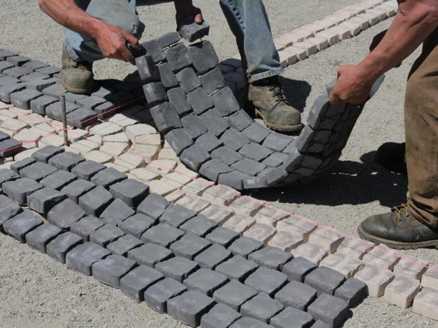 Charcoal colored stone comes in sheets, whic can be laid into the pattern.
